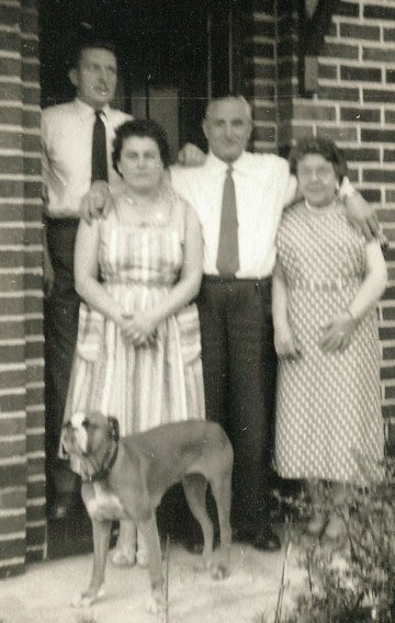 Harry & Ethel Statham with Harry & Eleanor Statham at 13 Newcroft Road. Accompanied by Harry & Ethel's dog 'Gina'